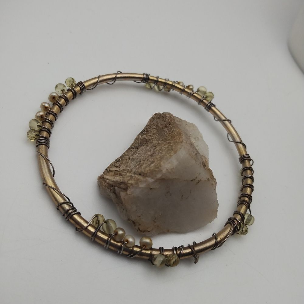 Aztec primitive wrapped‎ gold toned bangle